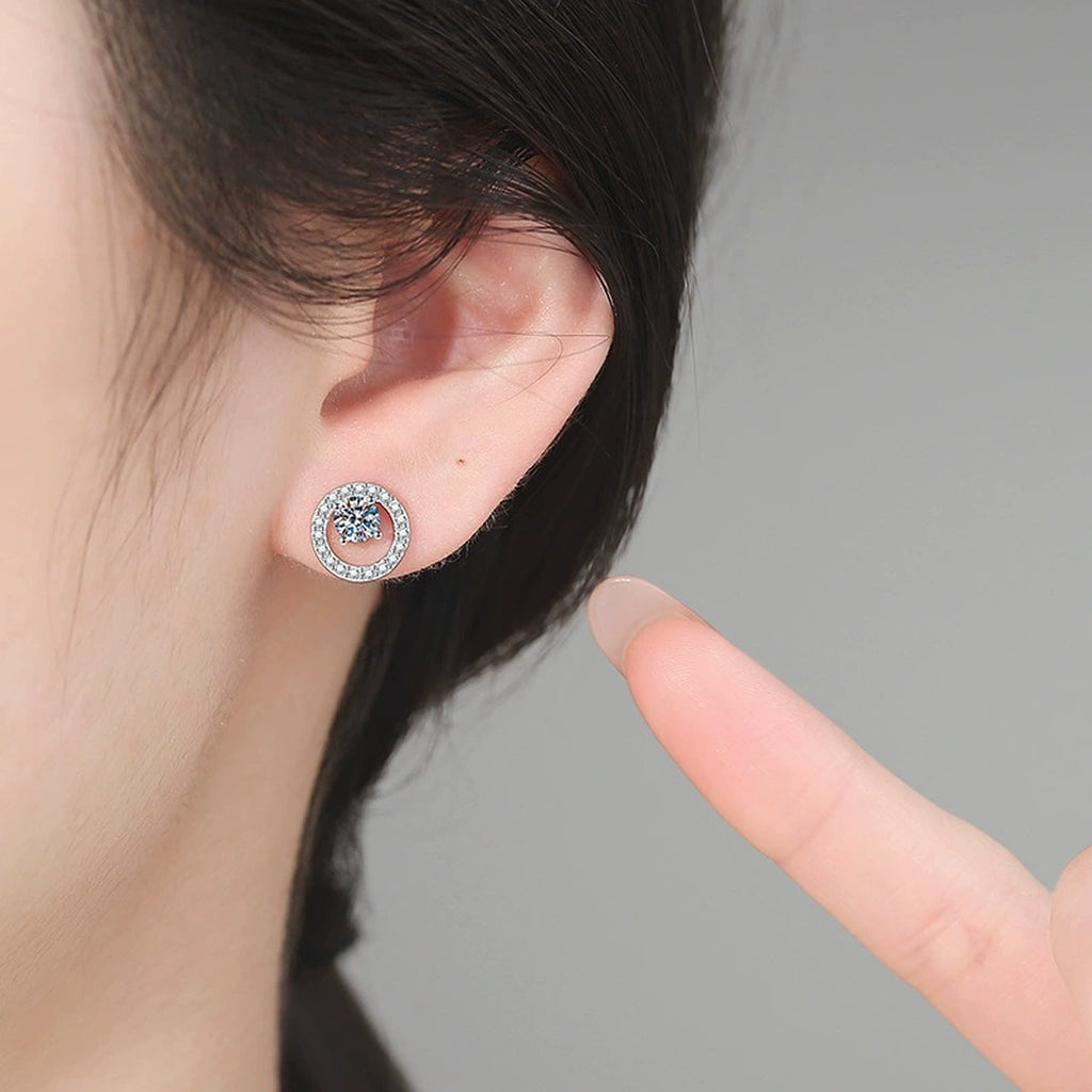 Circle Halo Moissanite Stud Earrings in White Gold-Plated S925 Sterling Silver with CZ worn on ear by model
