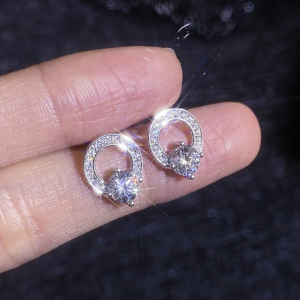 Open Circle Moissanite Stud Earrings in White Gold-Plated S925 Sterling Silver with CZ dark background product display view