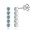 Green Moissanite Line Stud Earrings in White Gold-Plated S925 Silver on clean white background showing the pair and vertical line stud earrings set with green moissanite stones