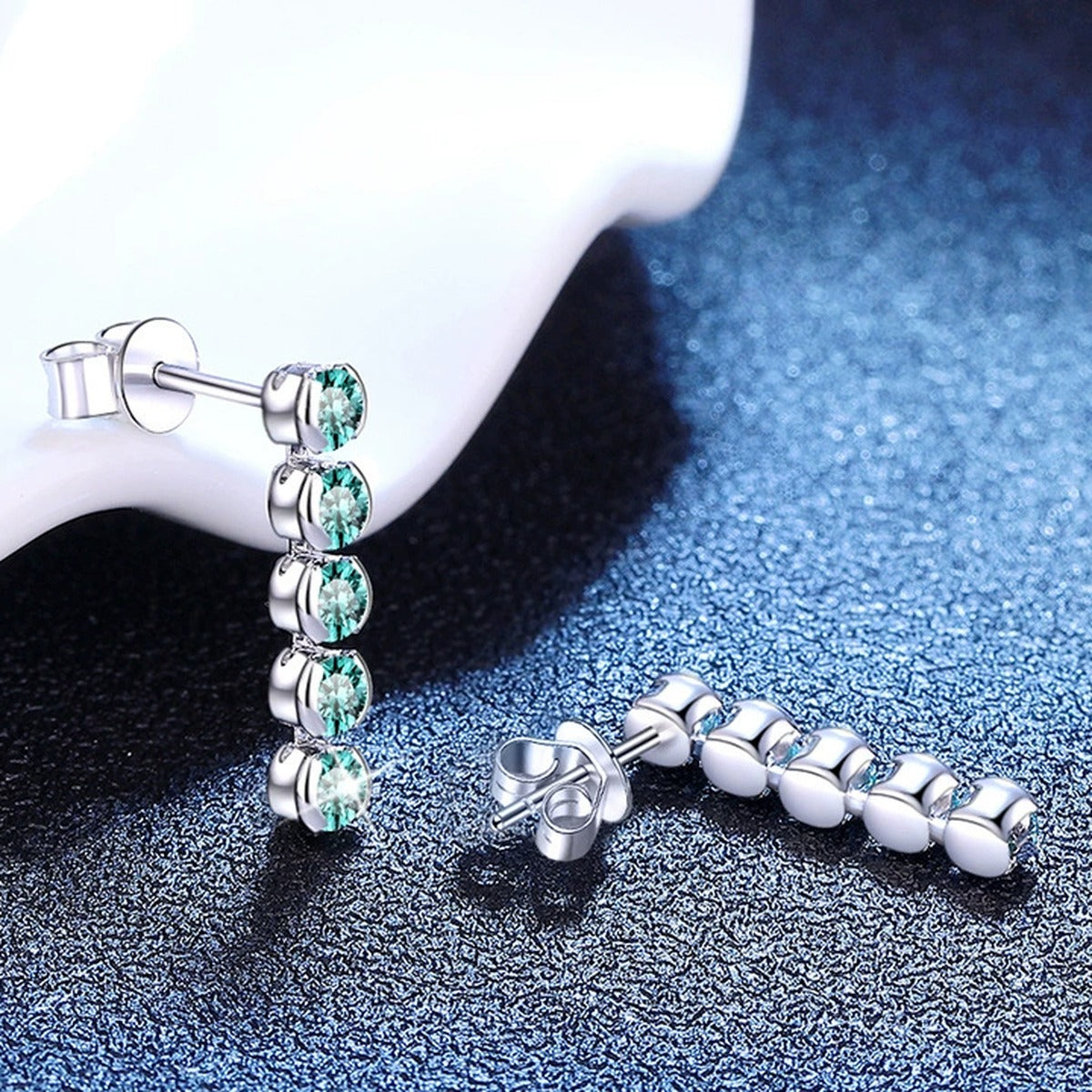 Green Moissanite Line Stud Earrings in White Gold-Plated S925 Silver blue scene product view