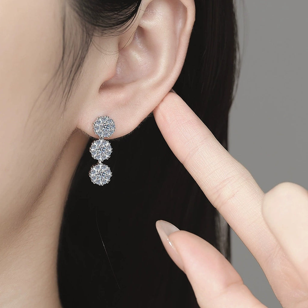 Triple Cluster Moissanite Drop Earrings with CZ in White Gold-Plated S925 worn on ear by model