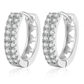 Pavé Moissanite Hoop Earrings in White Gold-Plated S925 Sterling Silver on clean white background showing the pair and wide rounded hoop earrings with dense pavé moissanite rows