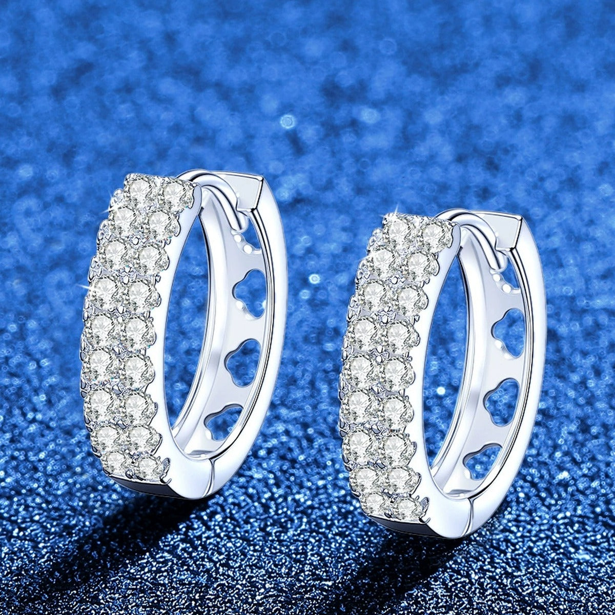 Pavé Moissanite Hoop Earrings in White Gold-Plated S925 Sterling Silver blue scene angled view