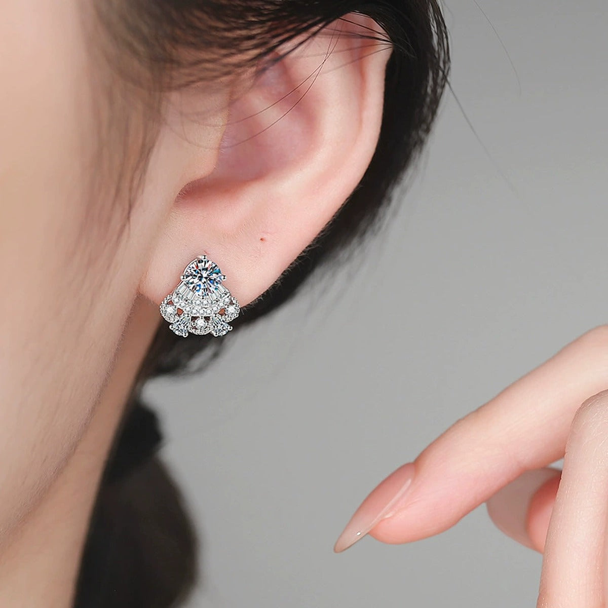 Fan Halo Moissanite Stud Earrings with CZ in White Gold-Plated S925 worn on ear by model