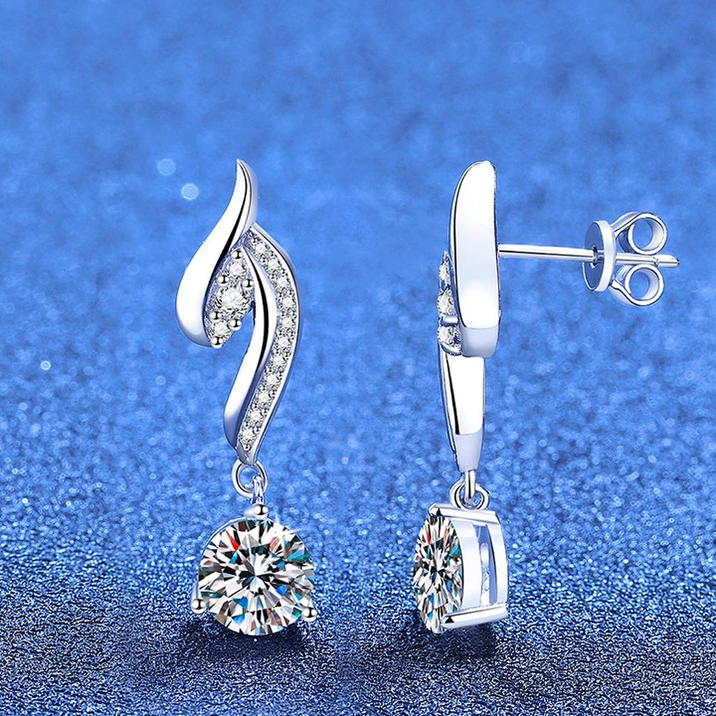 Swirl Moissanite Drop Earrings with CZ in White Gold-Plated S925 Silver blue scene angled view