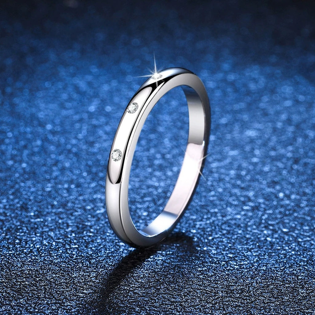 Minimal Flush Moissanite Band Ring blue background product view