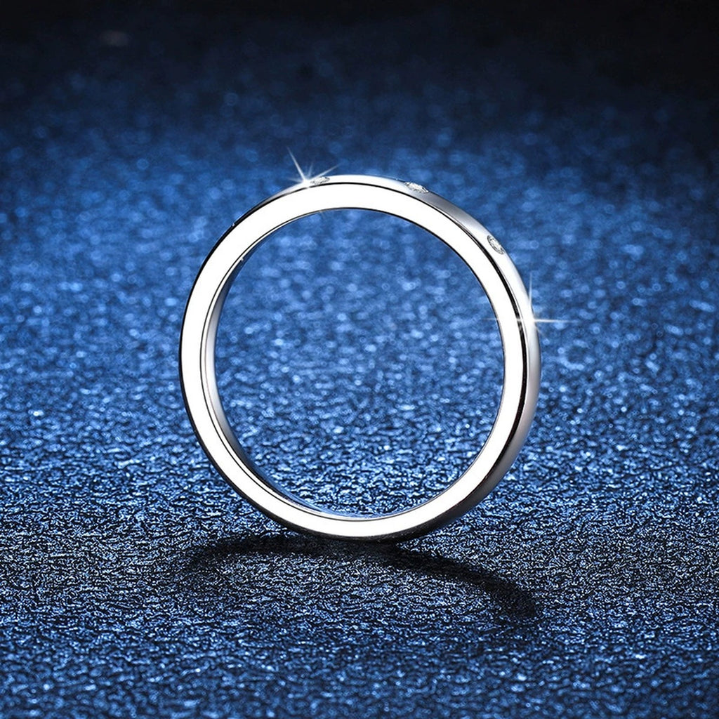 Minimal Flush Moissanite Band Ring blue background product view