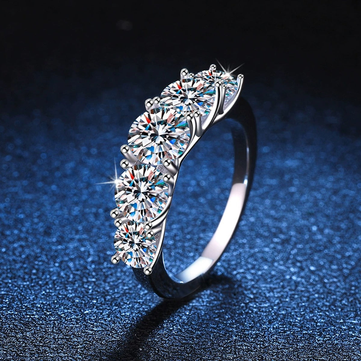 Graduated Five Stone Moissanite Ring blue background product view