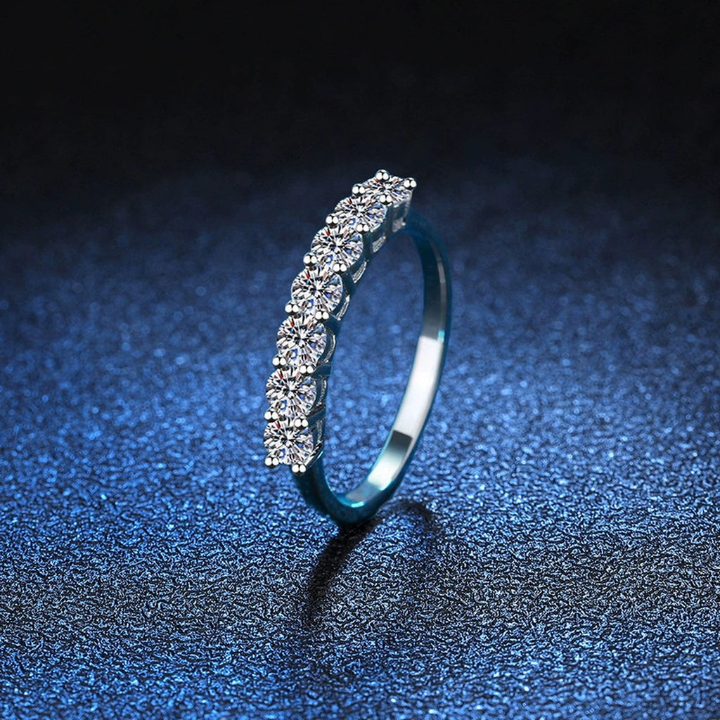 Graduated Moissanite Half Eternity Ring blue background product view