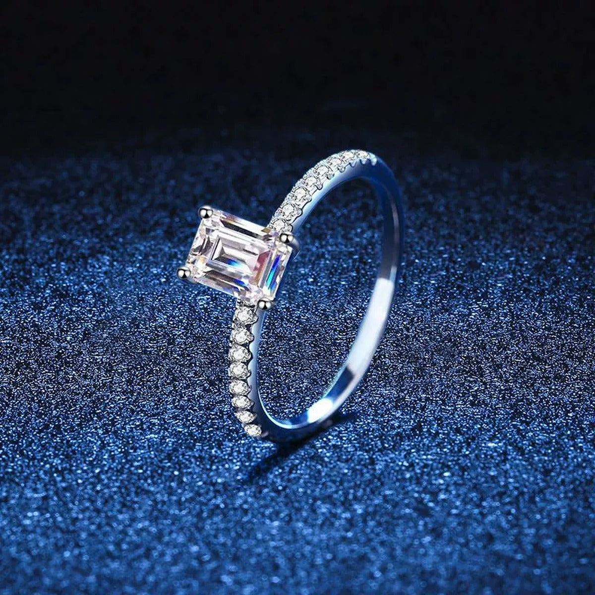 Emerald and Radiant Cut Moissanite Ring with CZ blue background product view