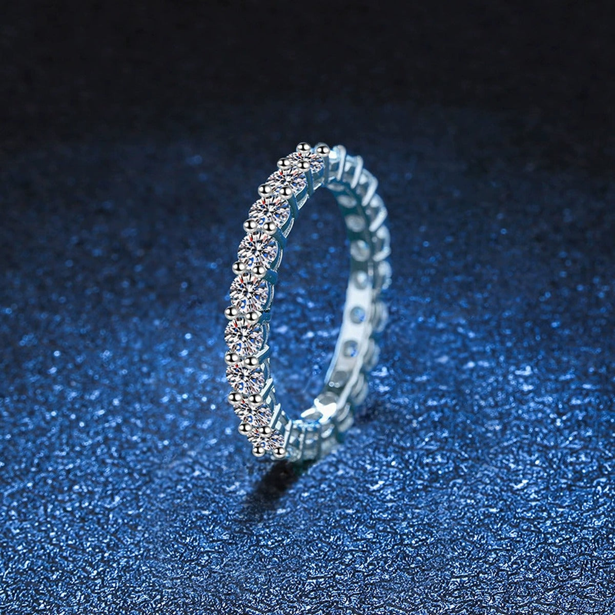 Full Eternity Round Moissanite Band Ring blue background product view
