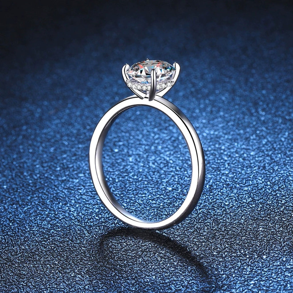 Oval Moissanite Engagement Ring with CZ blue background product view