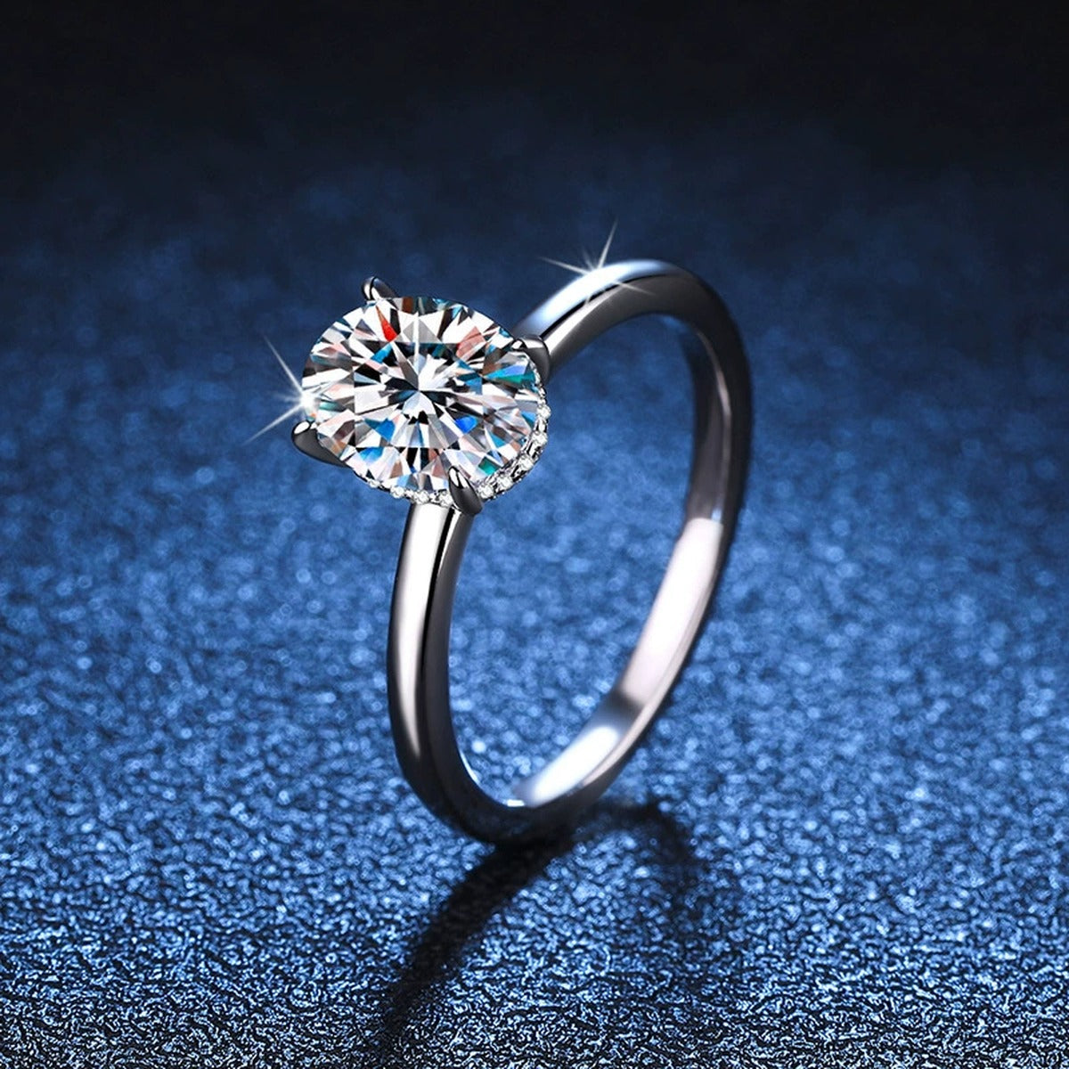 Oval Moissanite Engagement Ring with CZ blue background product view