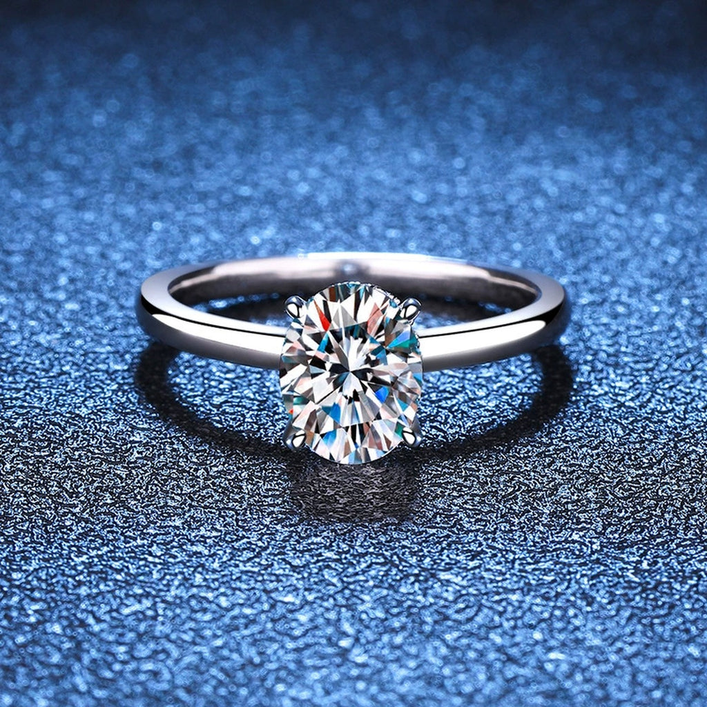 Oval Moissanite Engagement Ring with CZ blue background product view