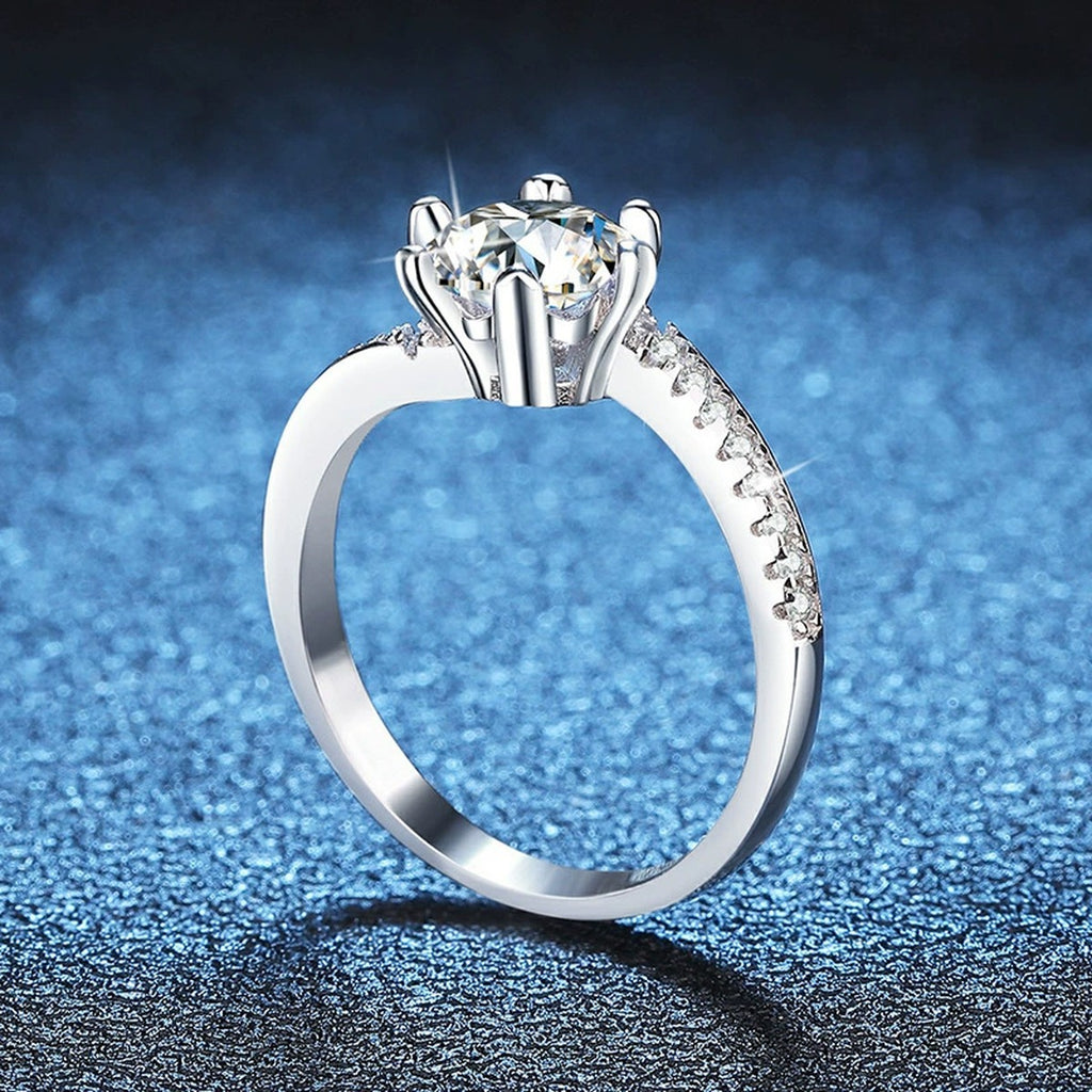 Round Solitaire Moissanite Ring with CZ blue background product view