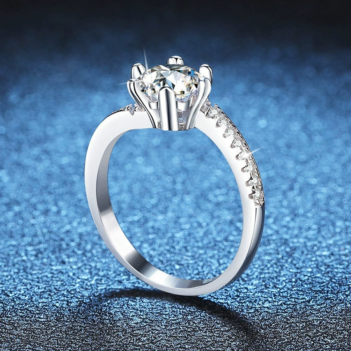 Round Solitaire Moissanite Ring with CZ blue background product view