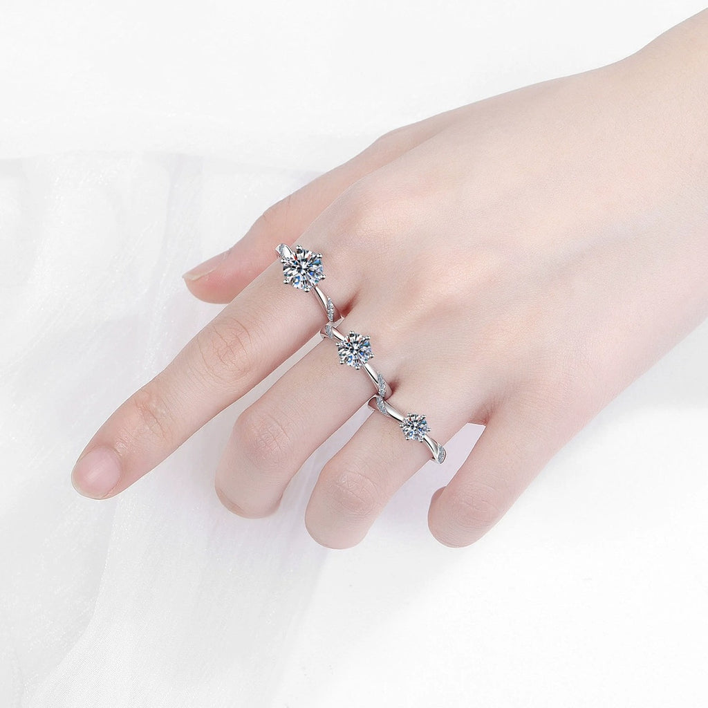 Round Moissanite Solitaire Ring with CZ worn on hand by model