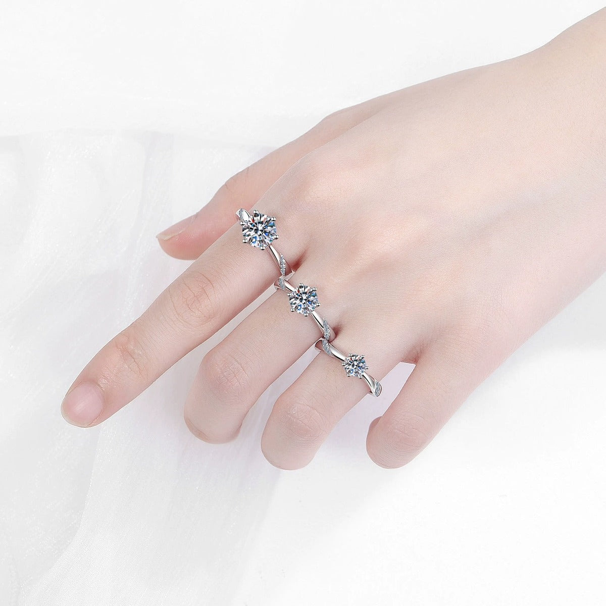 Round Moissanite Solitaire Ring with CZ worn on hand by model