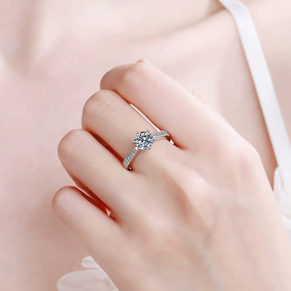 Round Moissanite Solitaire Ring with CZ worn on hand by model