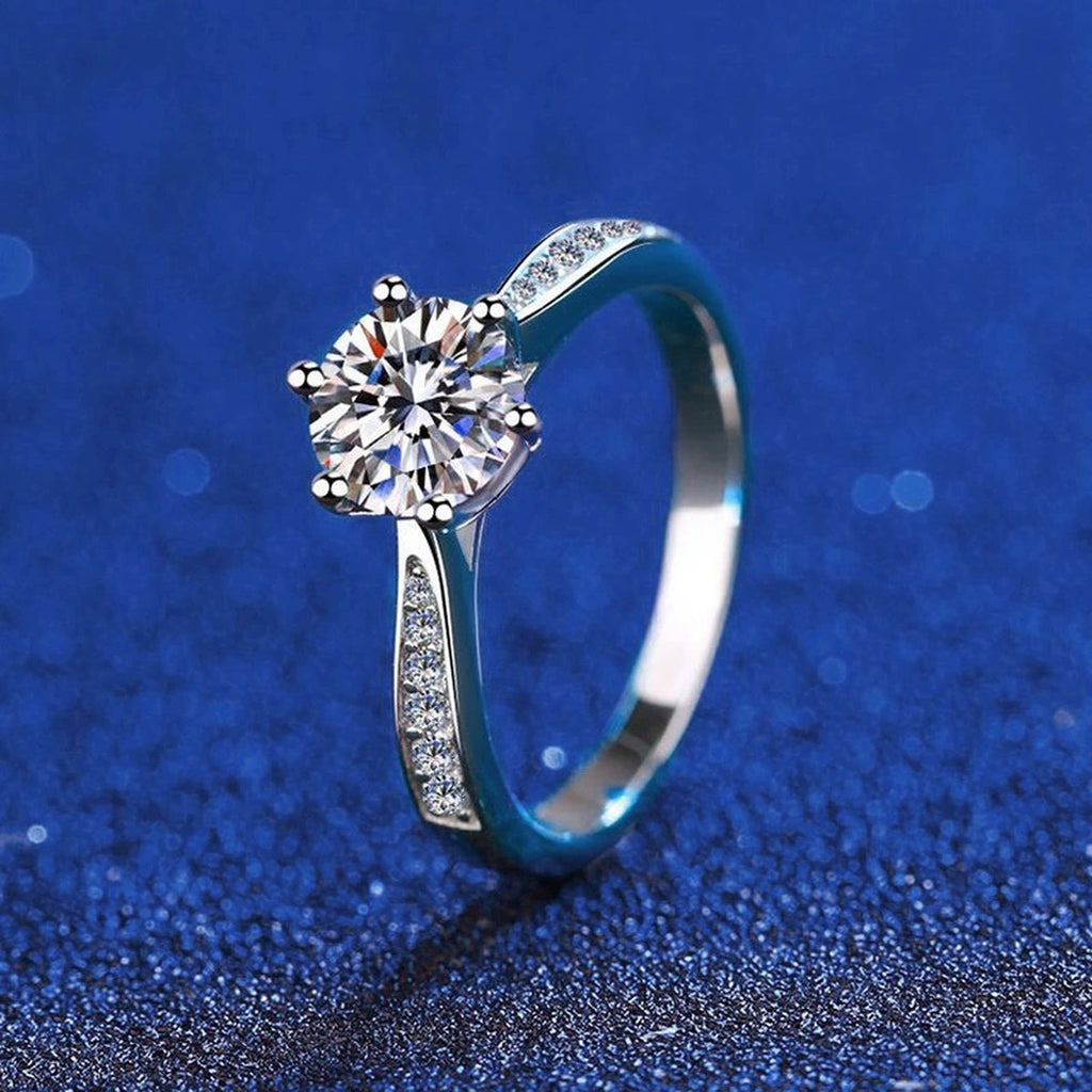 Round Moissanite Solitaire Ring with CZ blue background product view
