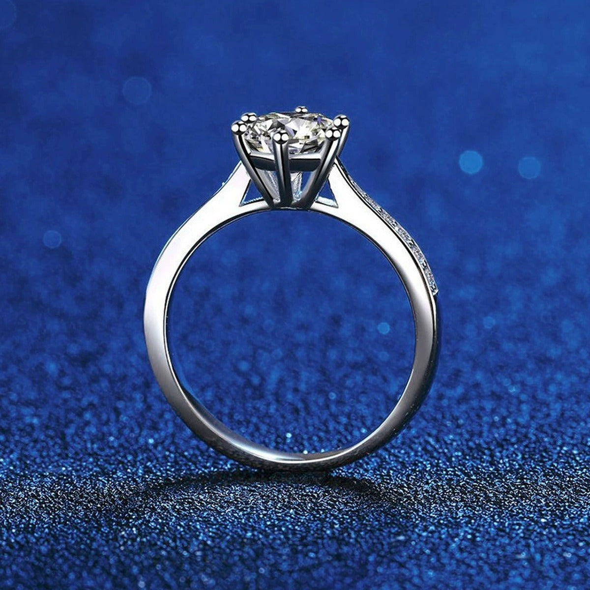 Round Moissanite Solitaire Ring with CZ blue background product view