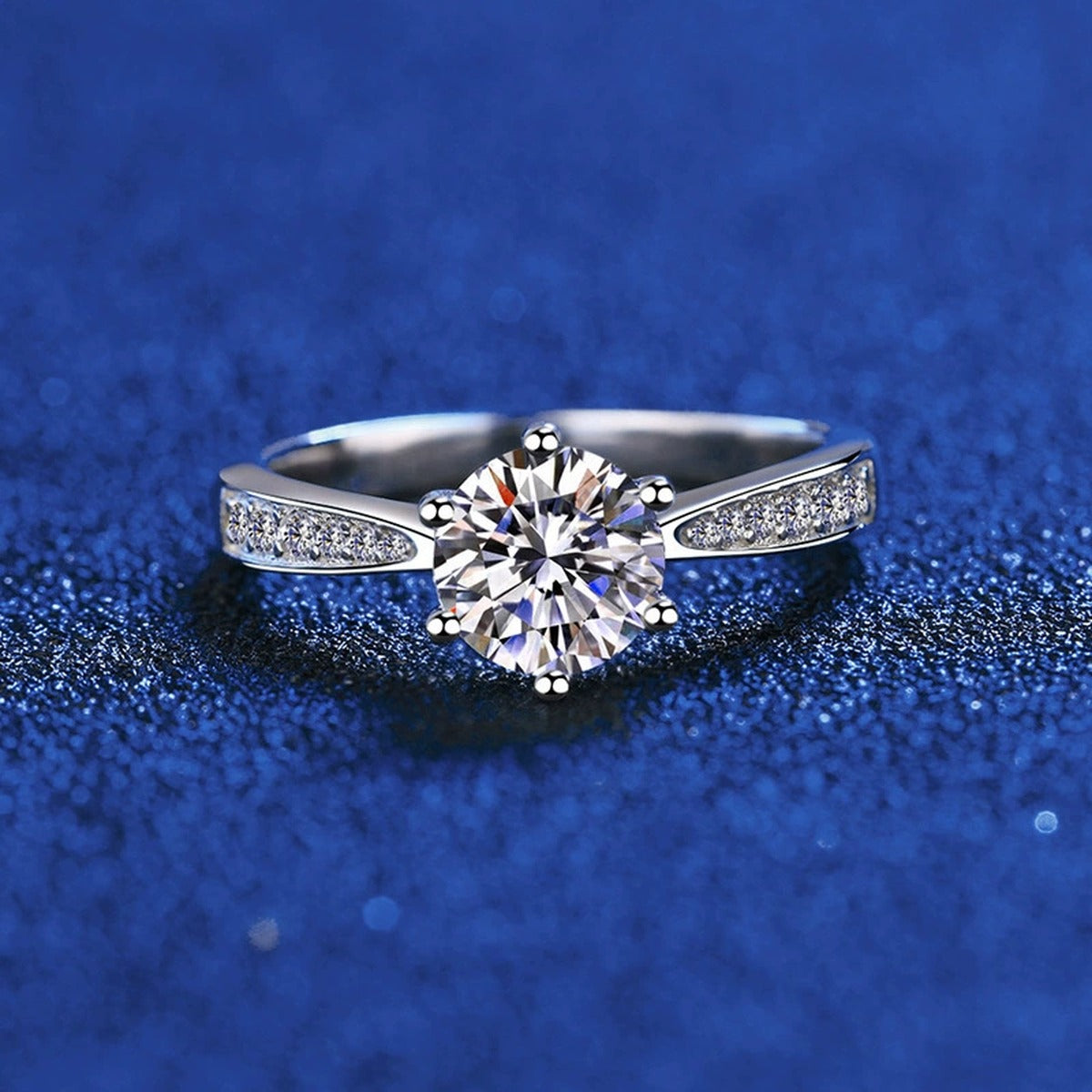 Round Moissanite Solitaire Ring with CZ blue background product view