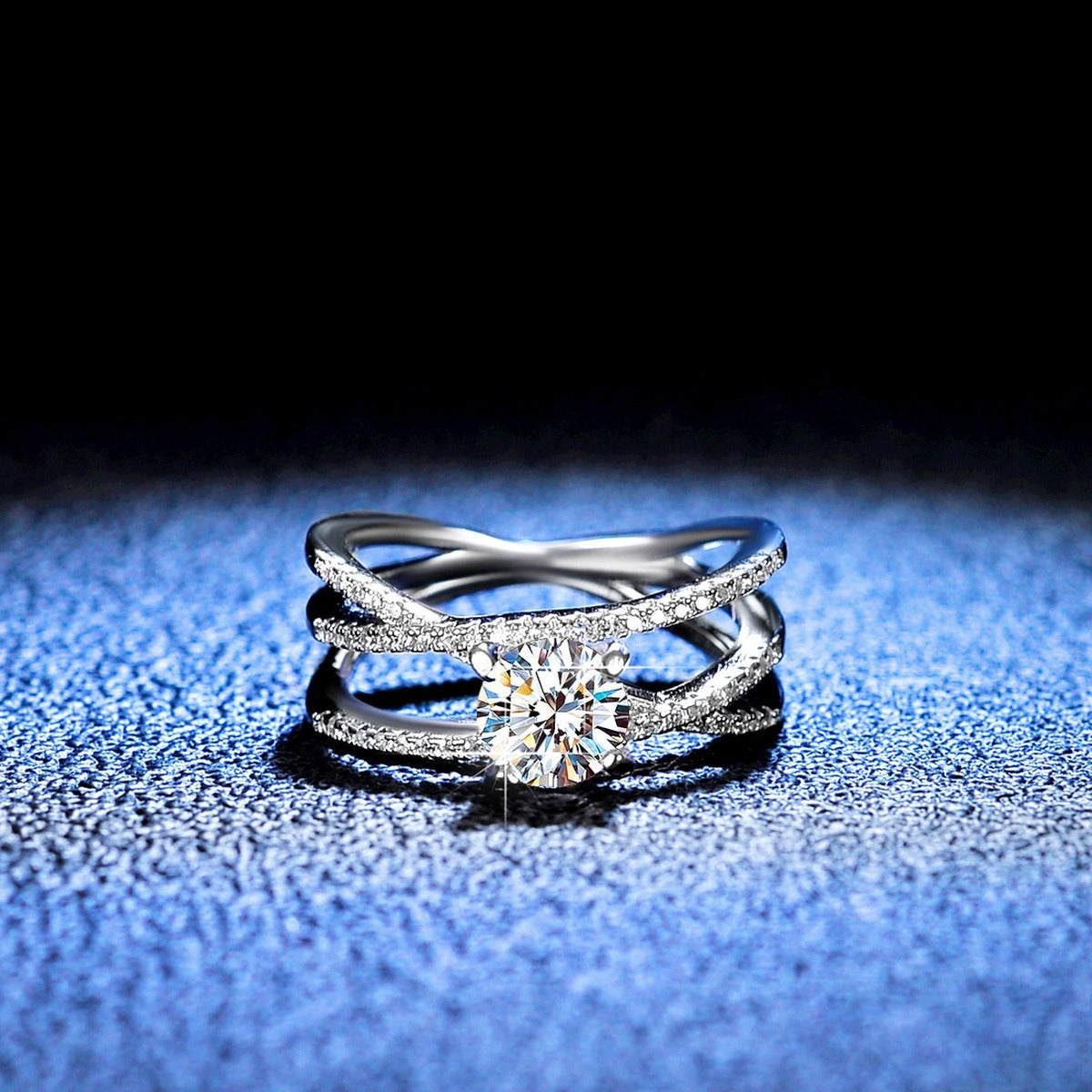 Split Shank Round Moissanite Ring with CZ blue background product view