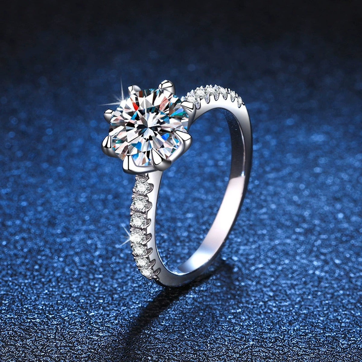 Round Moissanite Solitaire Ring with CZ blue background product view