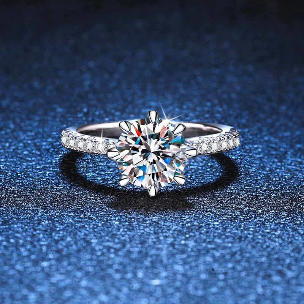 Round Moissanite Solitaire Ring with CZ blue background product view