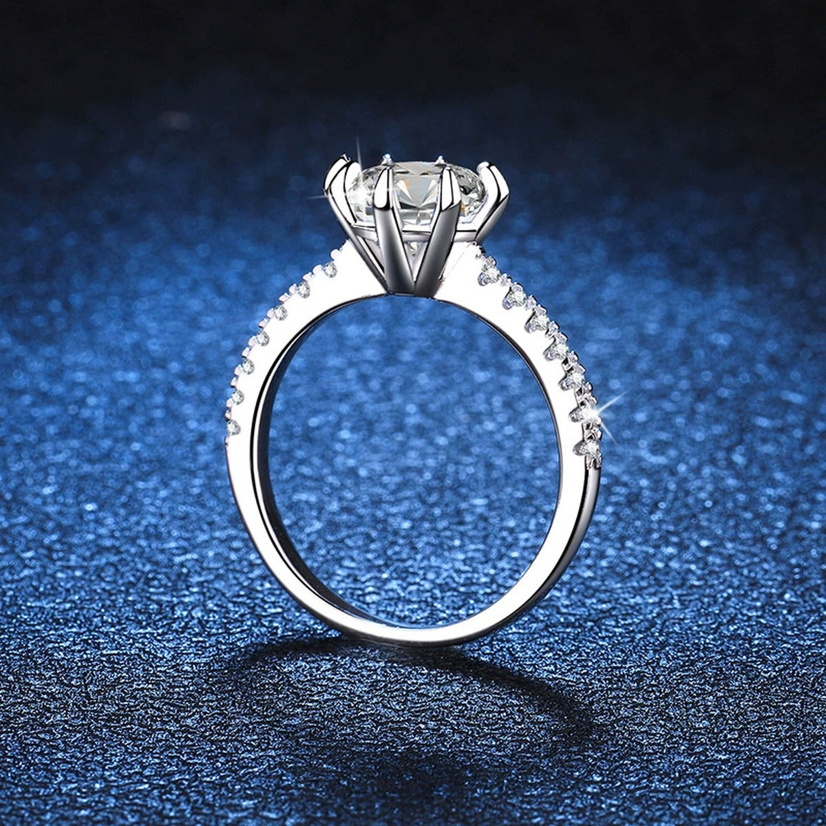 Round Moissanite Solitaire Ring with CZ blue background product view