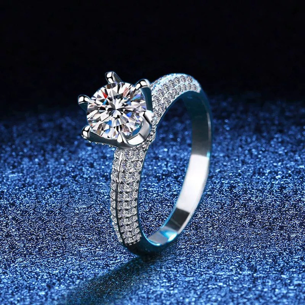 Split Shank Round Moissanite Ring with CZ blue background product view