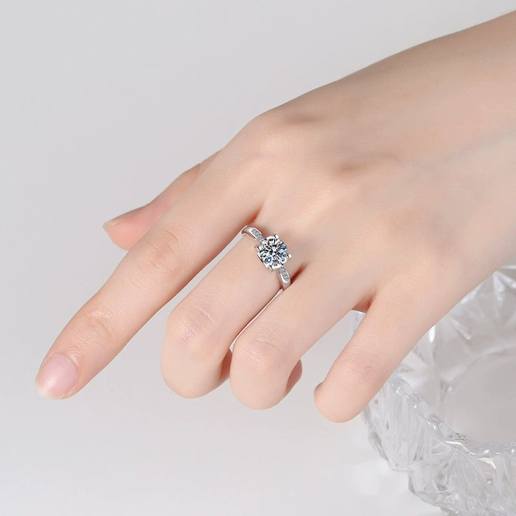 Round Moissanite Solitaire Ring with CZ worn on hand by model