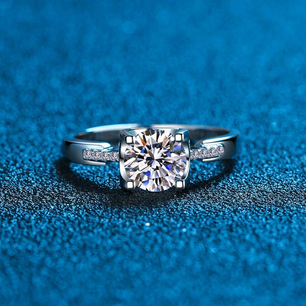 Round Moissanite Solitaire Ring with CZ blue background product view
