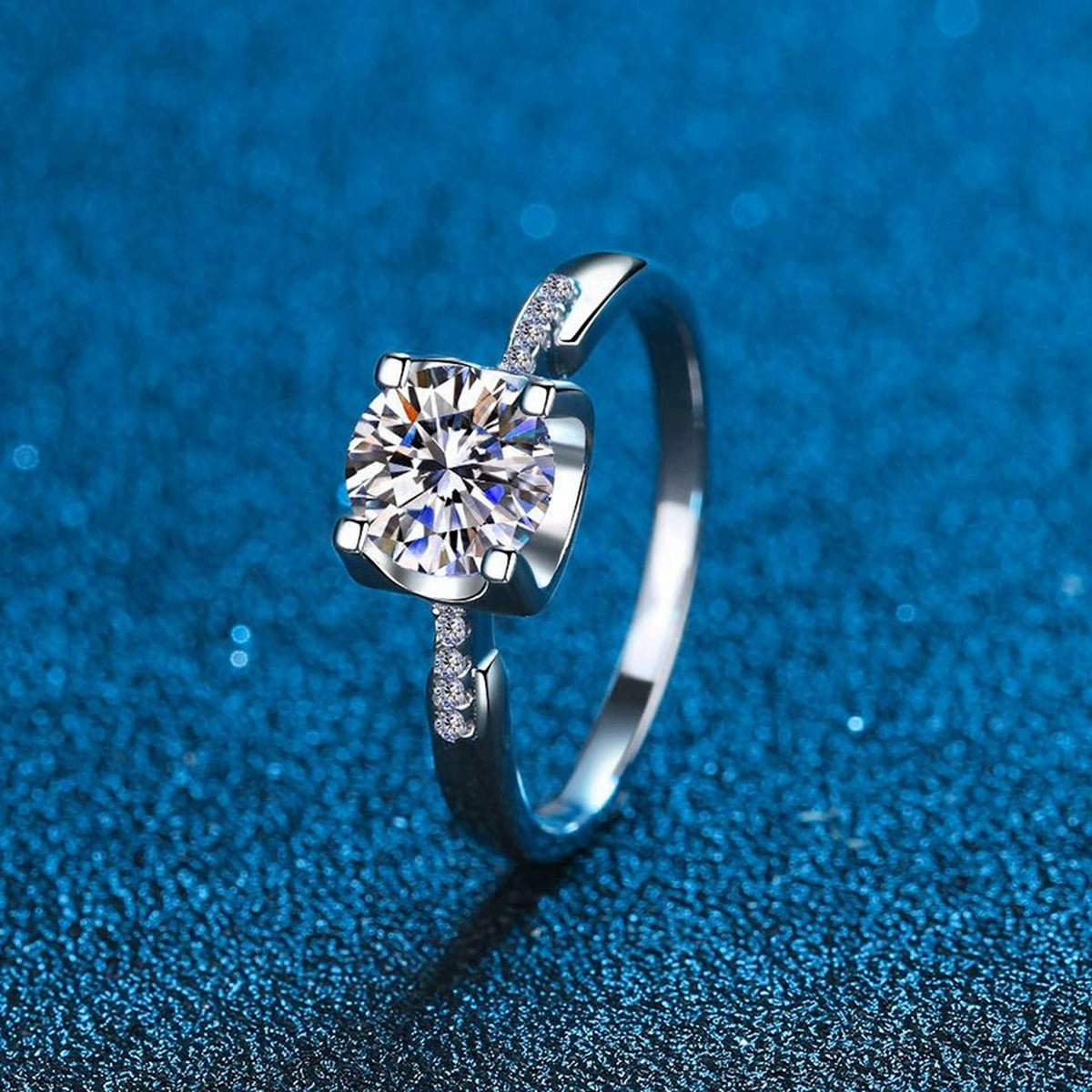 Round Moissanite Solitaire Ring with CZ blue background product view