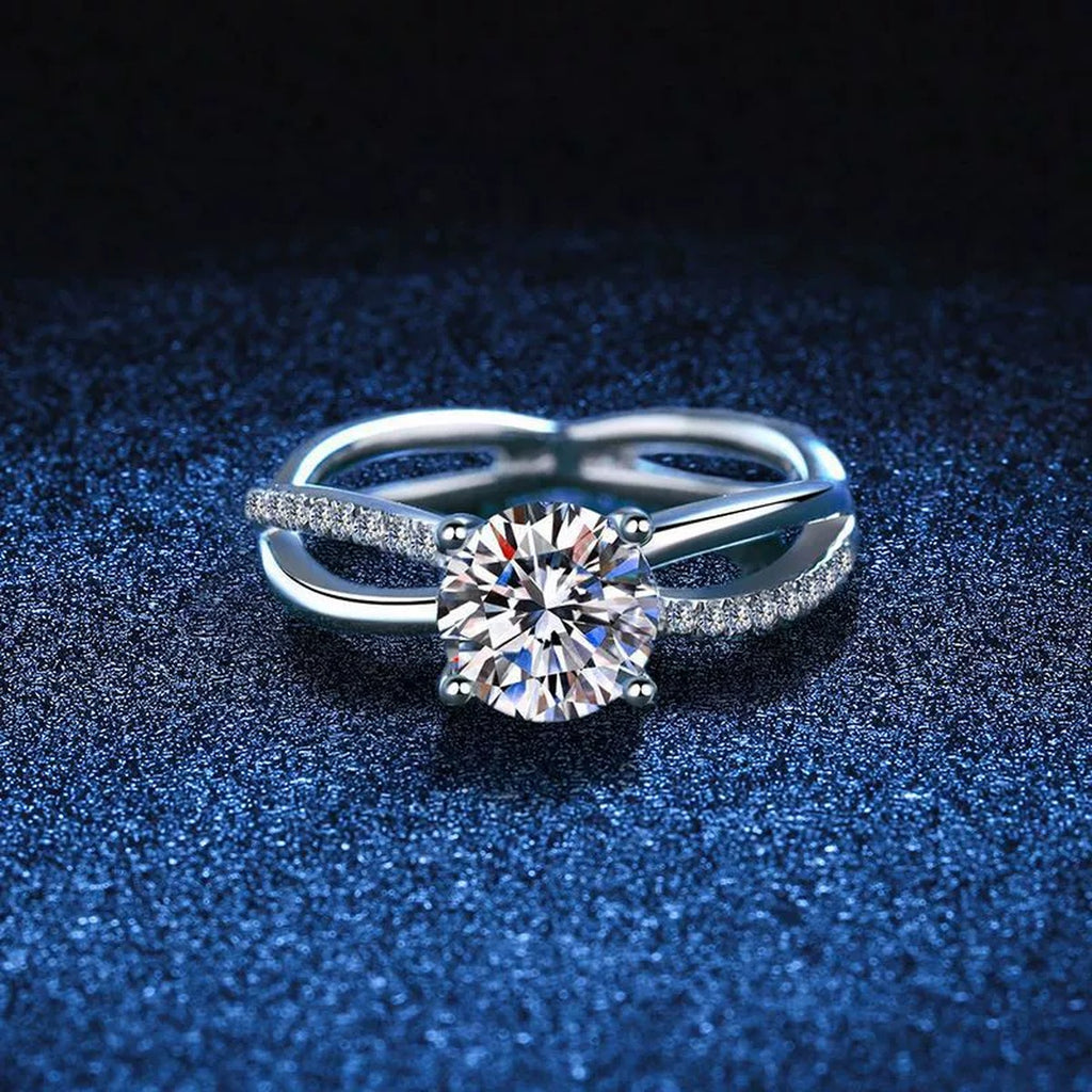 Interlocking Round Moissanite Ring with CZ blue background product view