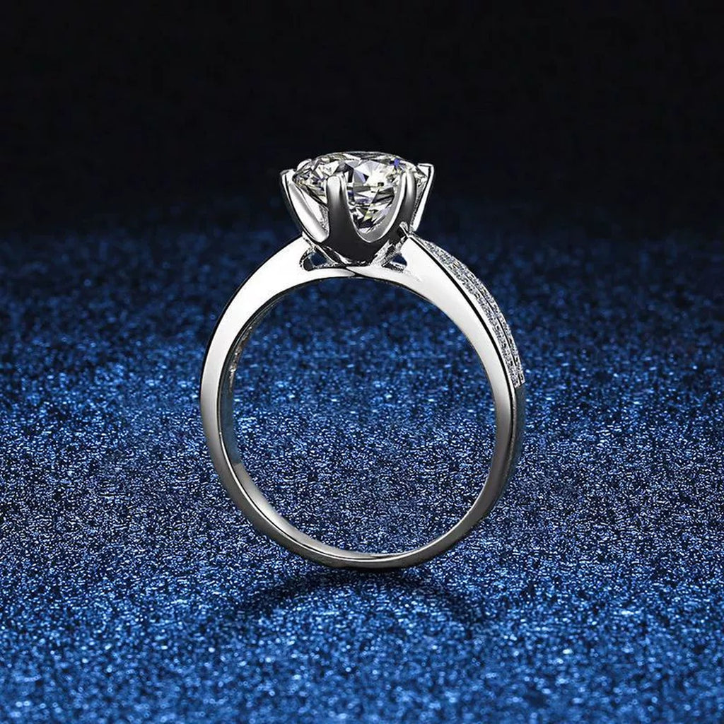 Round Moissanite Solitaire Ring with CZ blue background product view