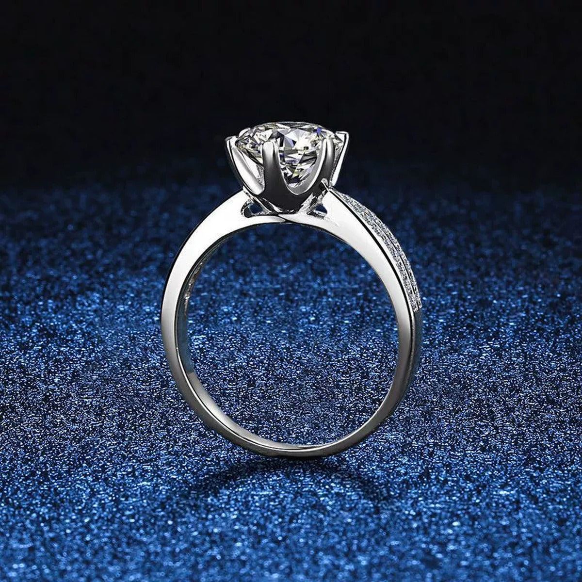 Round Moissanite Solitaire Ring with CZ blue background product view