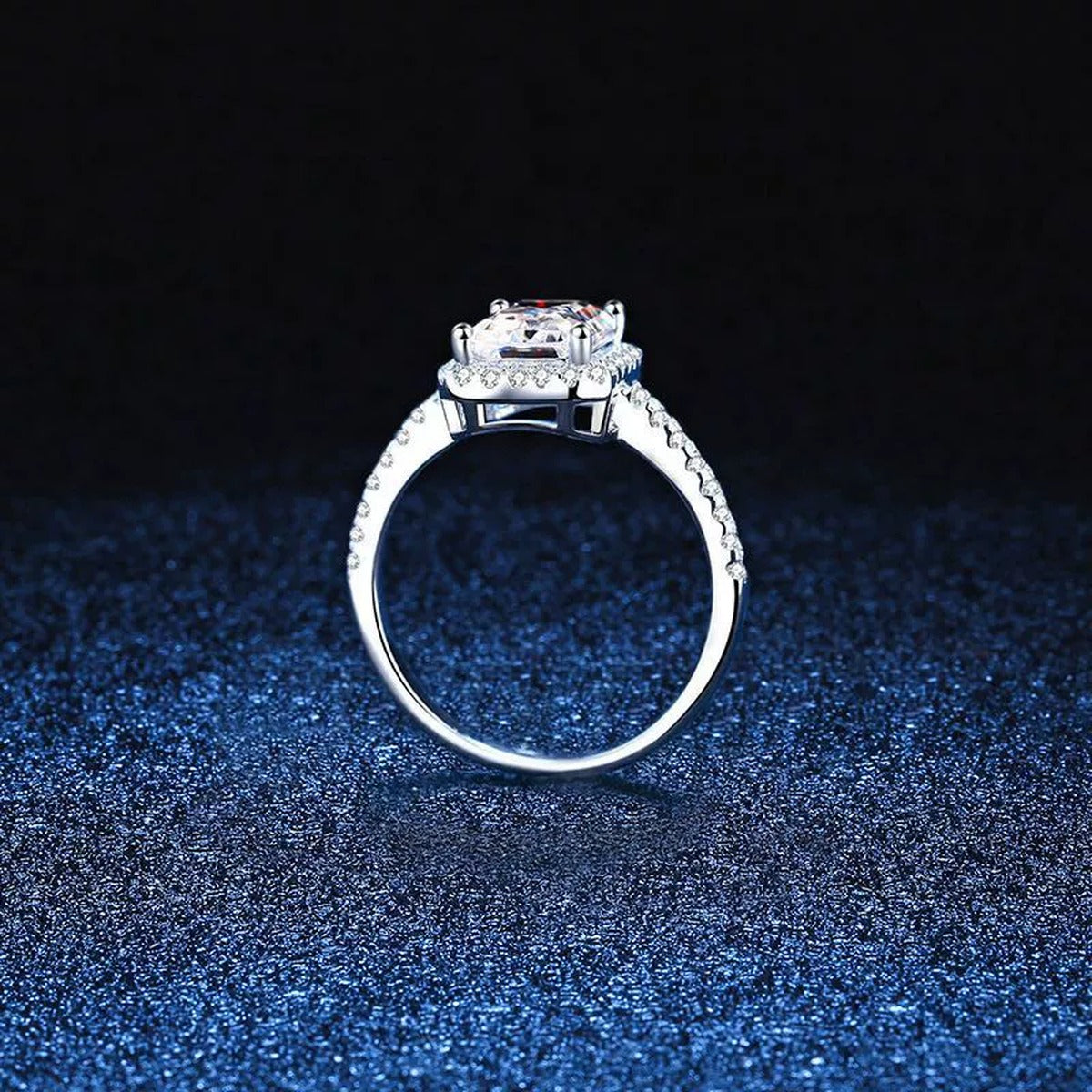 Emerald and Radiant Cut Moissanite Ring with CZ blue background product view