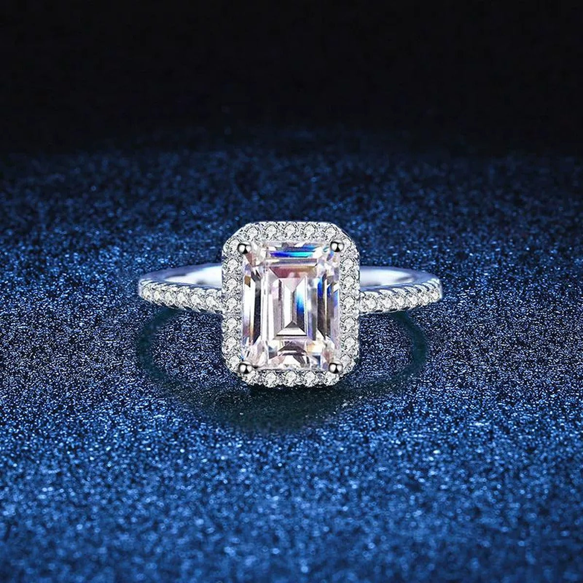 Emerald and Radiant Cut Moissanite Ring with CZ blue background product view
