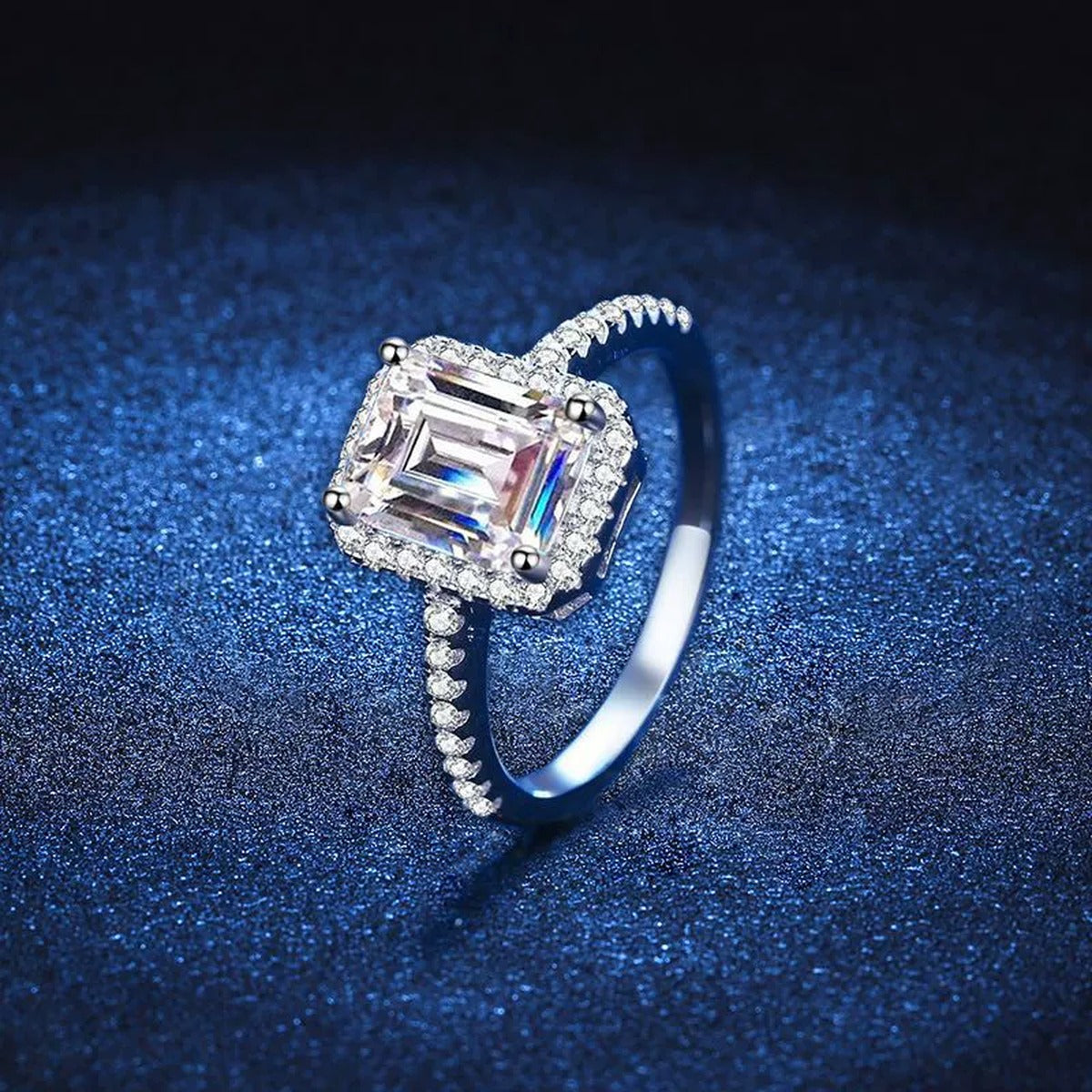 Emerald and Radiant Cut Moissanite Ring with CZ blue background product view