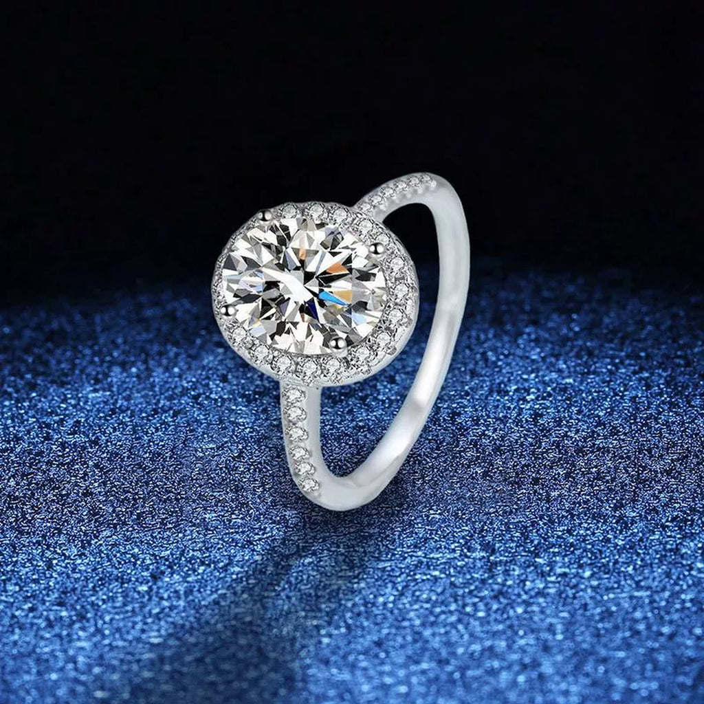 Oval Halo Moissanite Engagement Ring with CZ blue background product view