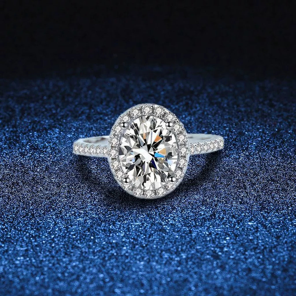 Oval Halo Moissanite Engagement Ring with CZ blue background product view