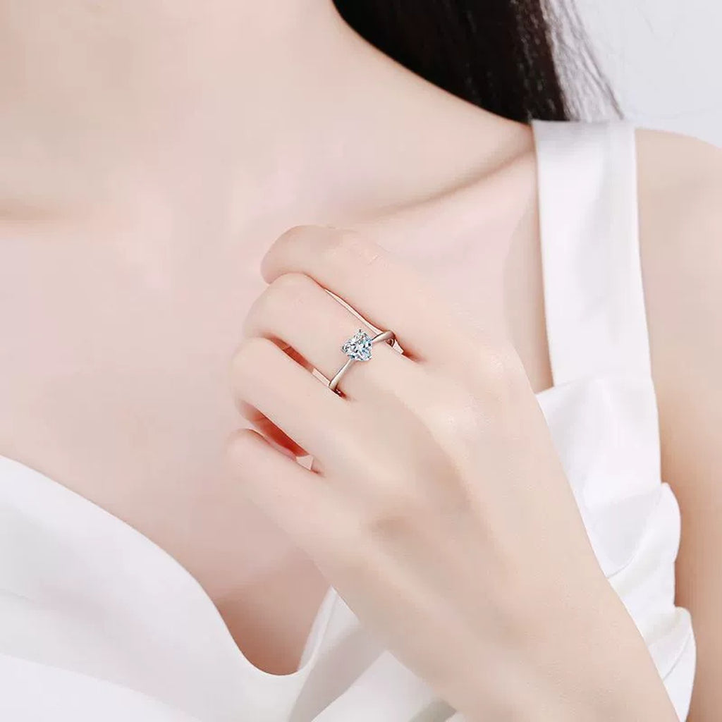 Heart Cut Moissanite Solitaire Ring worn on hand by model