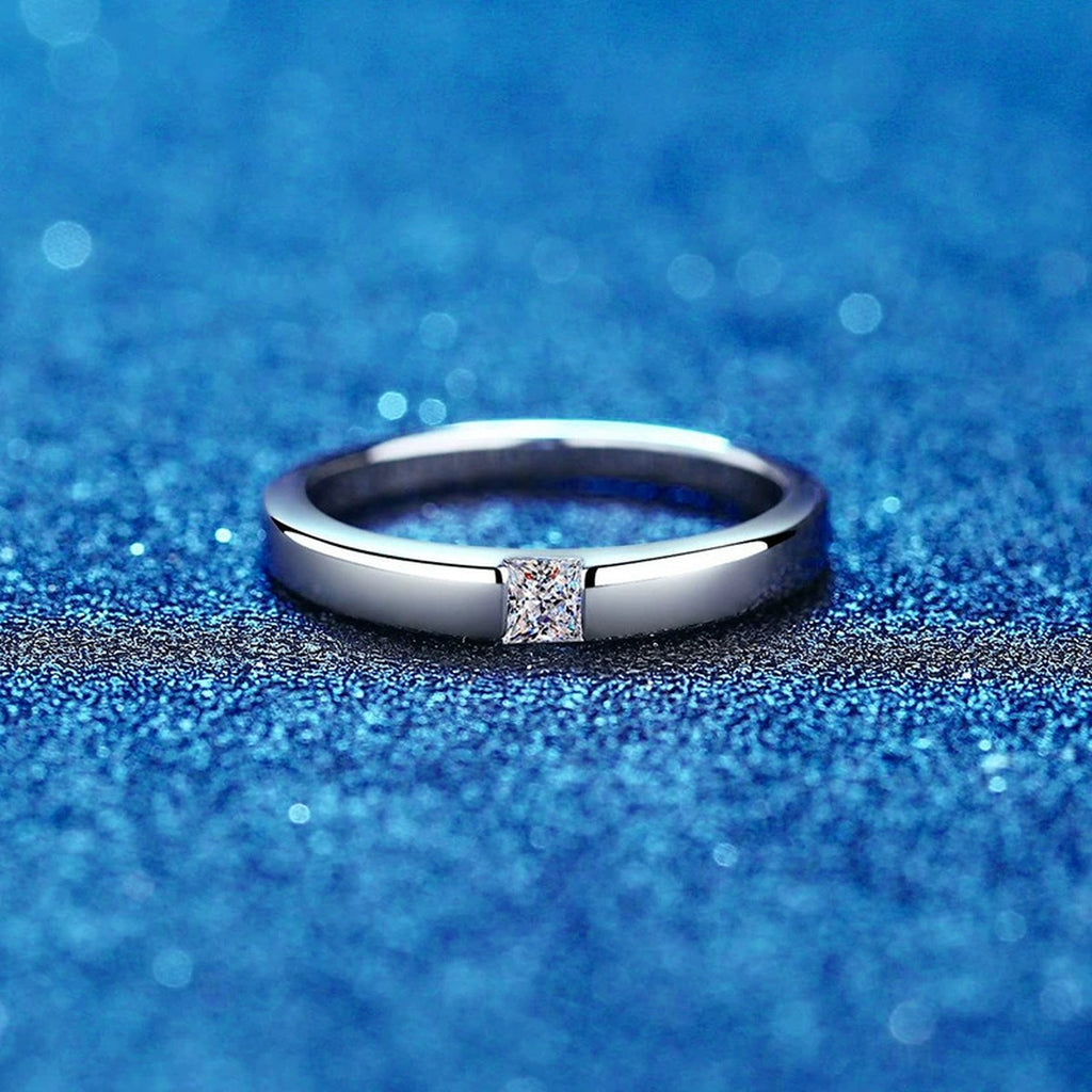 Bezel Moissanite Band Ring with CZ blue background product view