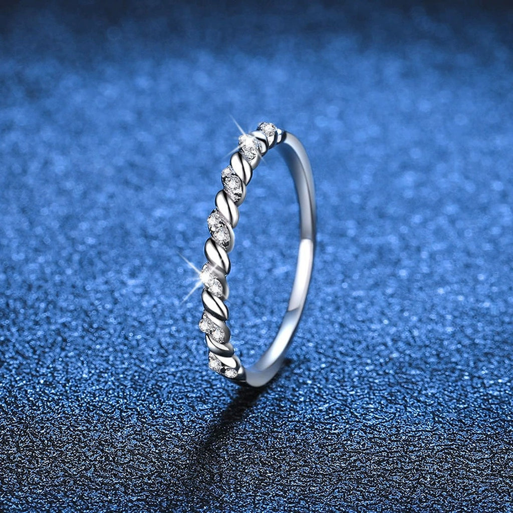Twisted Moissanite Band Ring blue background product view