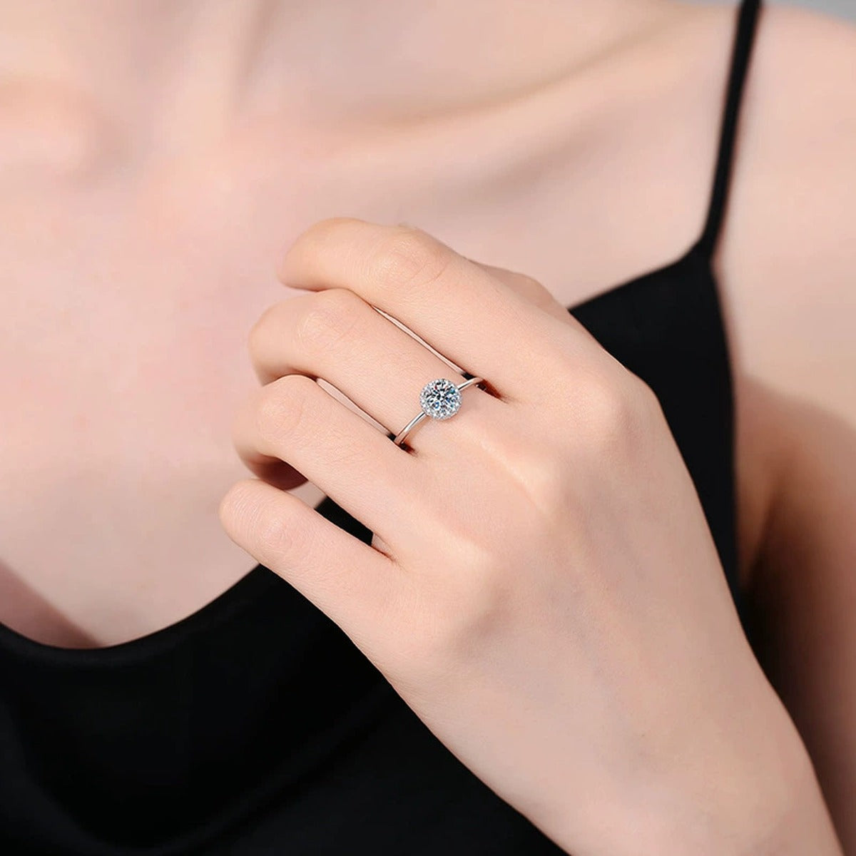 Round Moissanite Solitaire Ring with CZ worn on hand by model