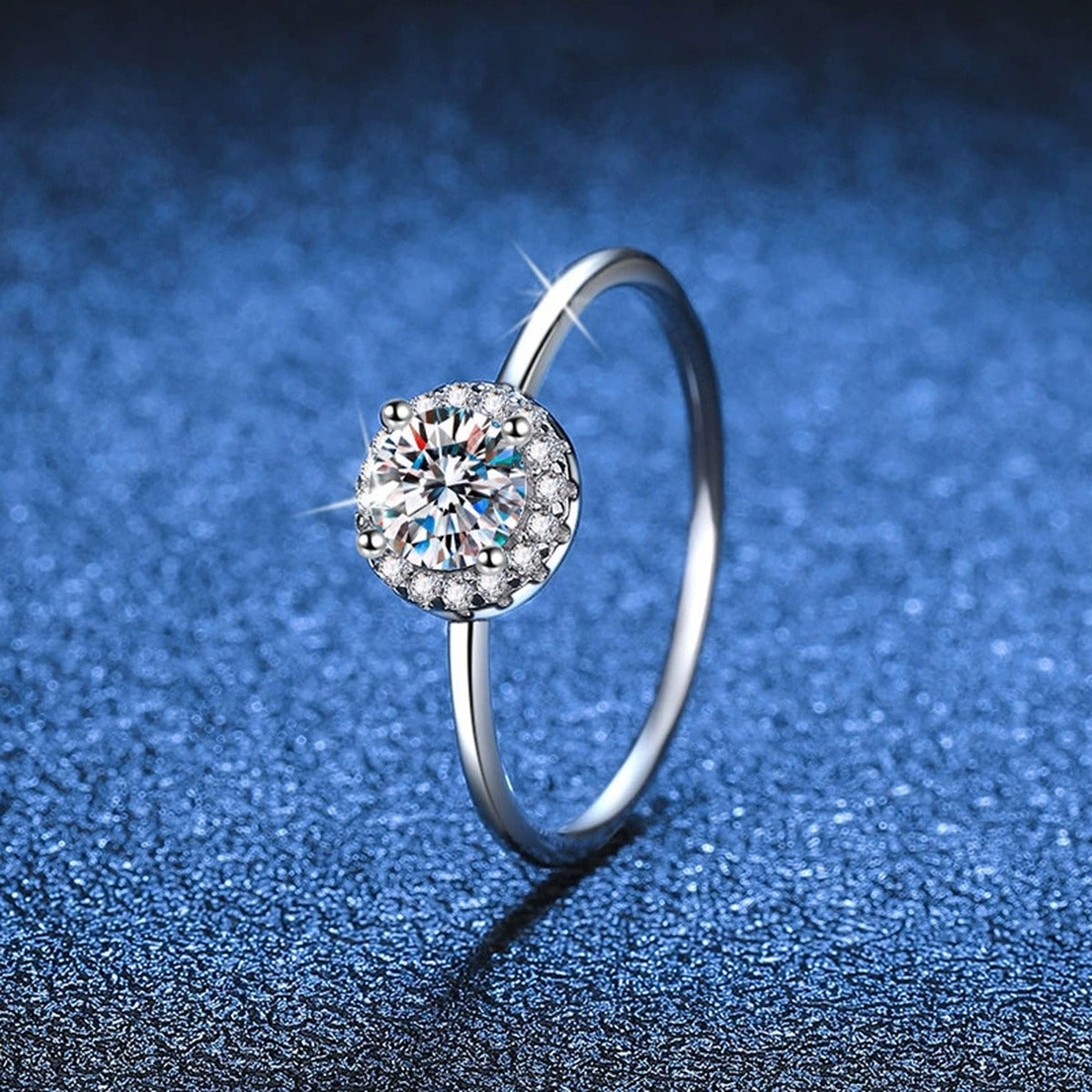 Round Moissanite Solitaire Ring with CZ blue background product view