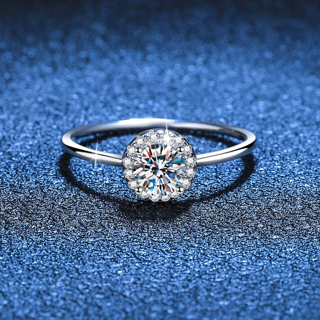 Round Moissanite Solitaire Ring with CZ blue background product view