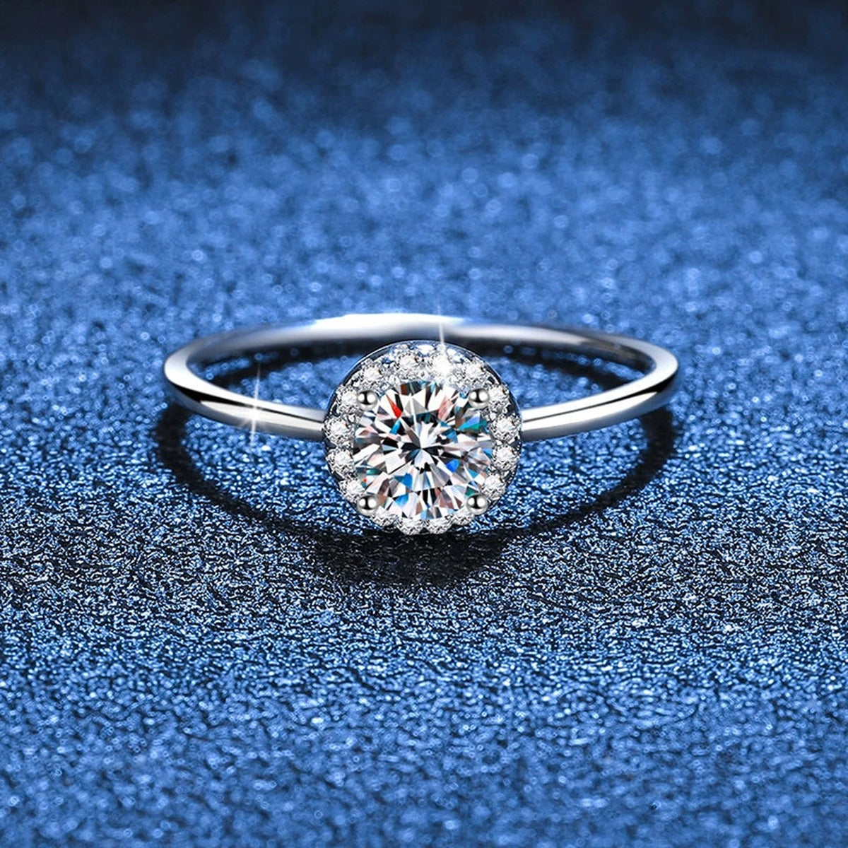Round Moissanite Solitaire Ring with CZ blue background product view