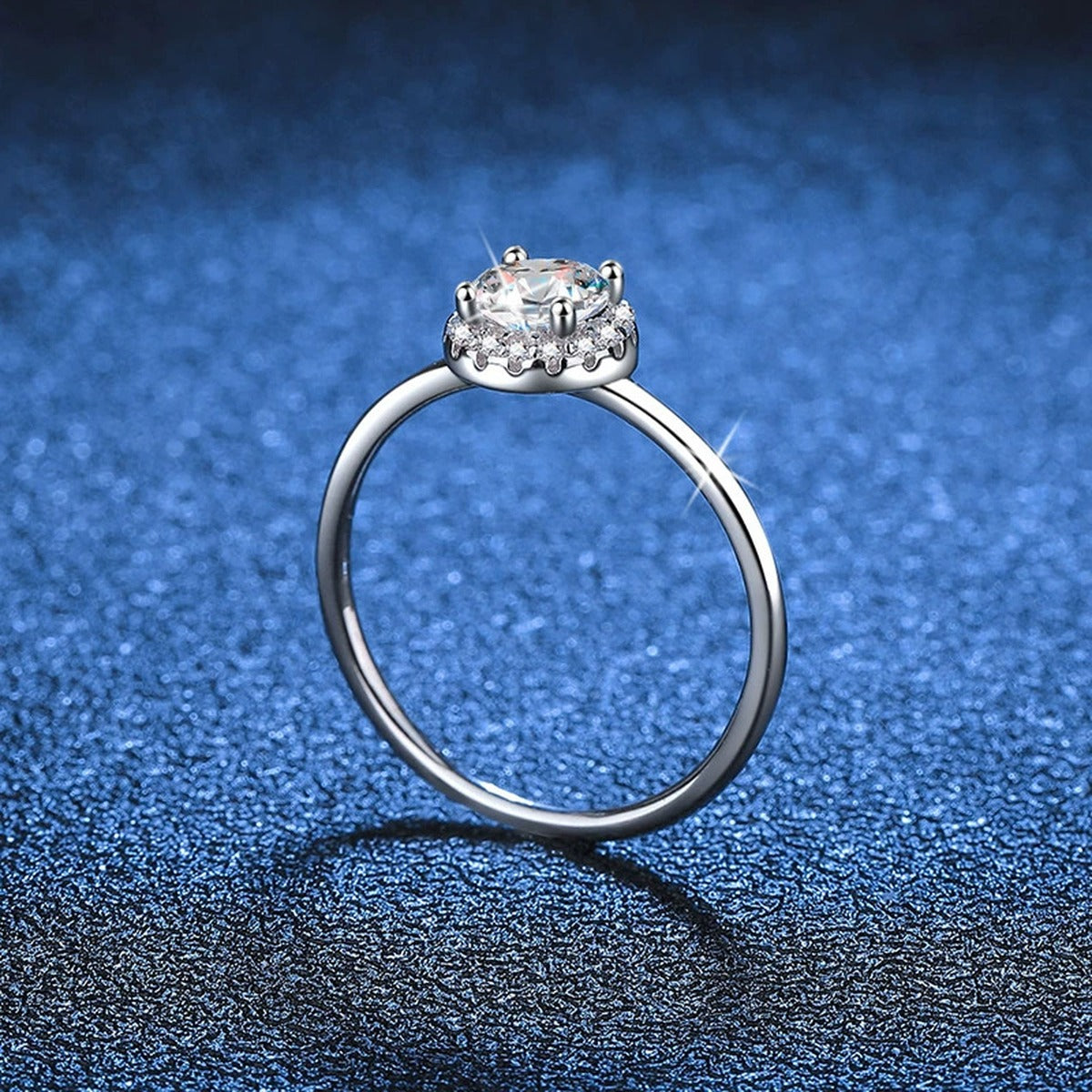 Round Moissanite Solitaire Ring with CZ blue background product view